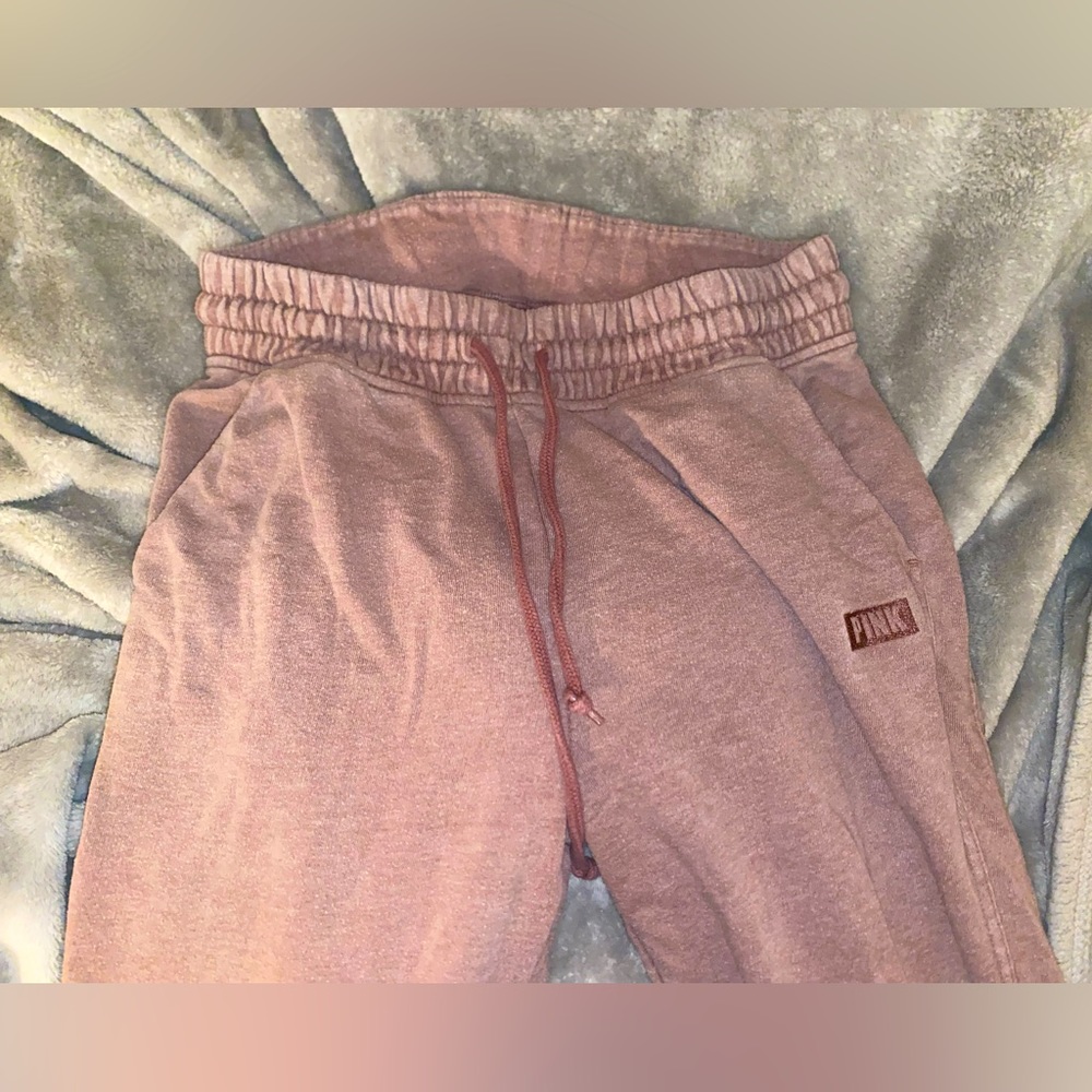 Comfortable sweatpants with a zip at the bottom for style